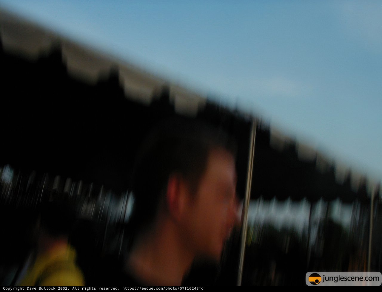 Blurry Silhouette of a Man in Front of a Tent