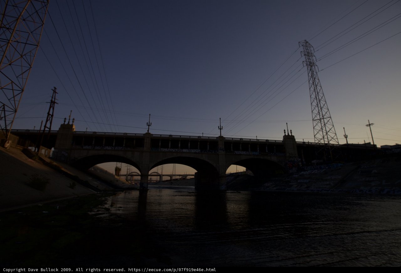 Power Lines Over an Arch Bridge