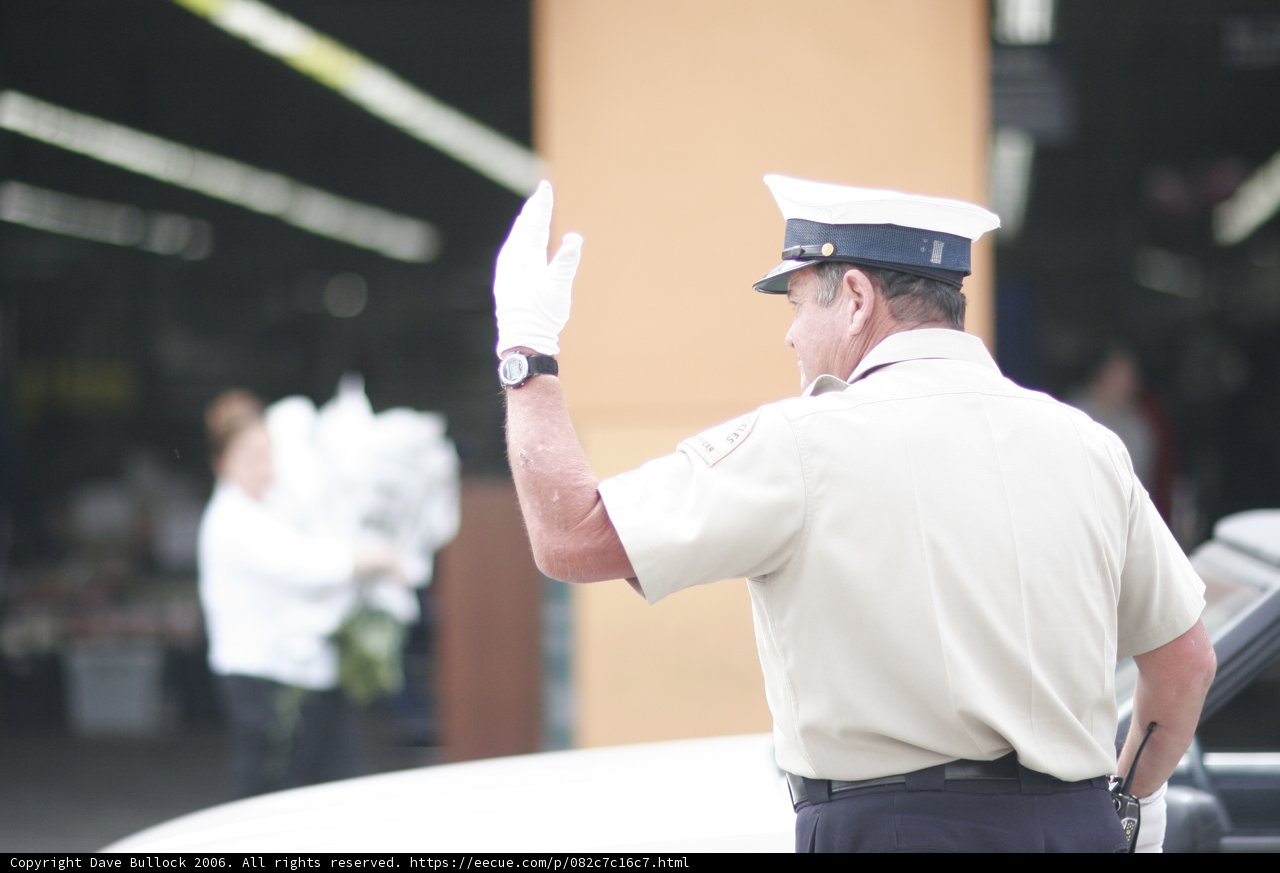 Officer waves goodbye to loved one