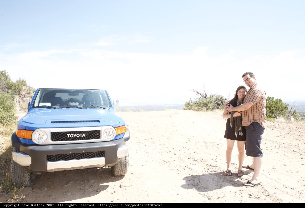 Couple Poses with Toyota FJ Cruiser in Desert