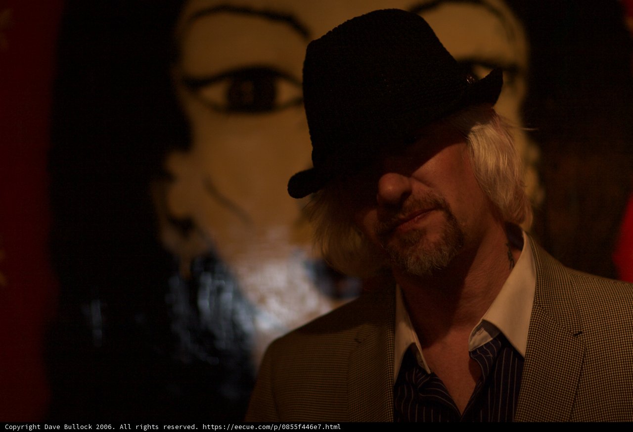 White-haired gentleman sporting a stylish hat