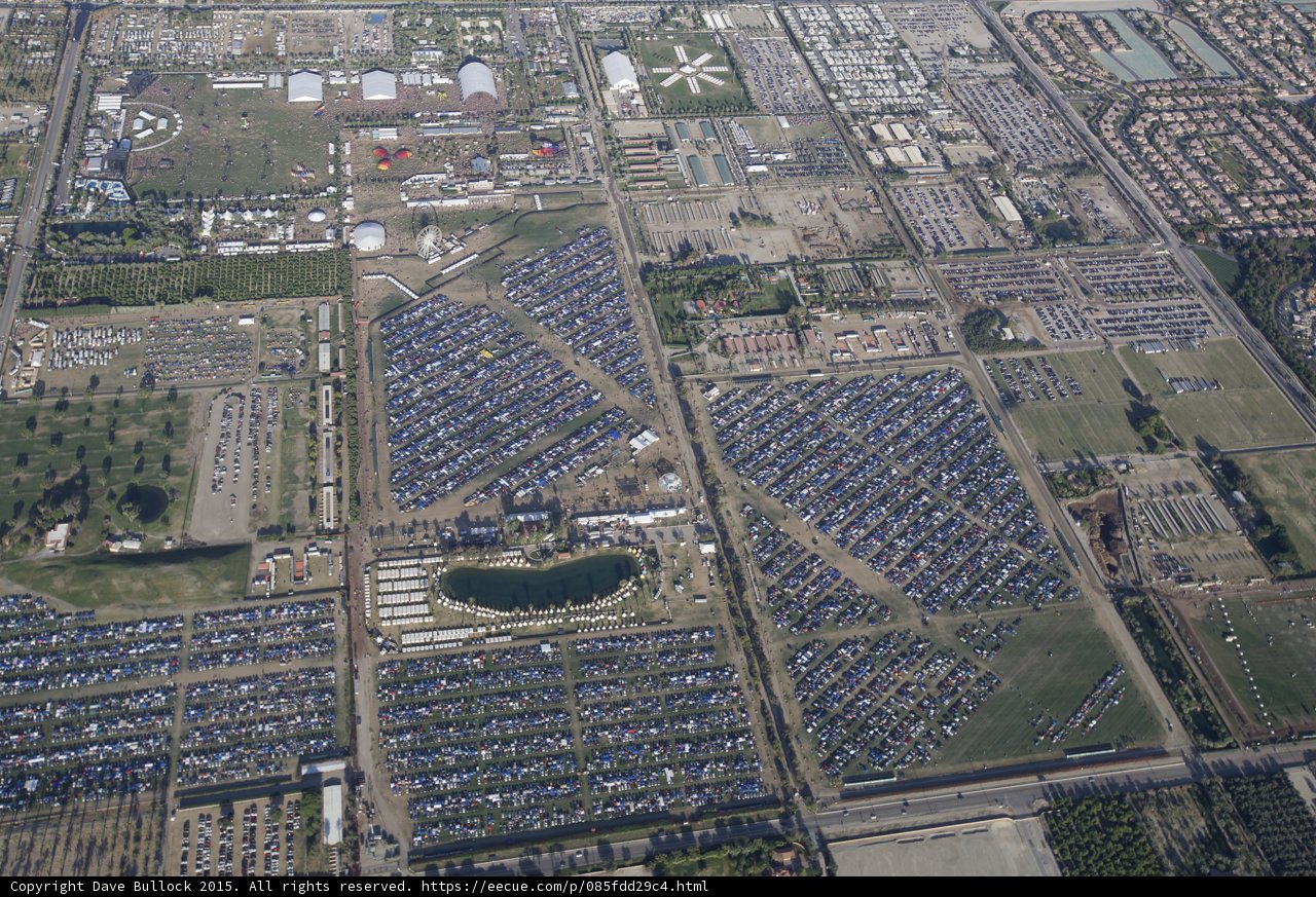 Overhead of a Bustling Parking Lot