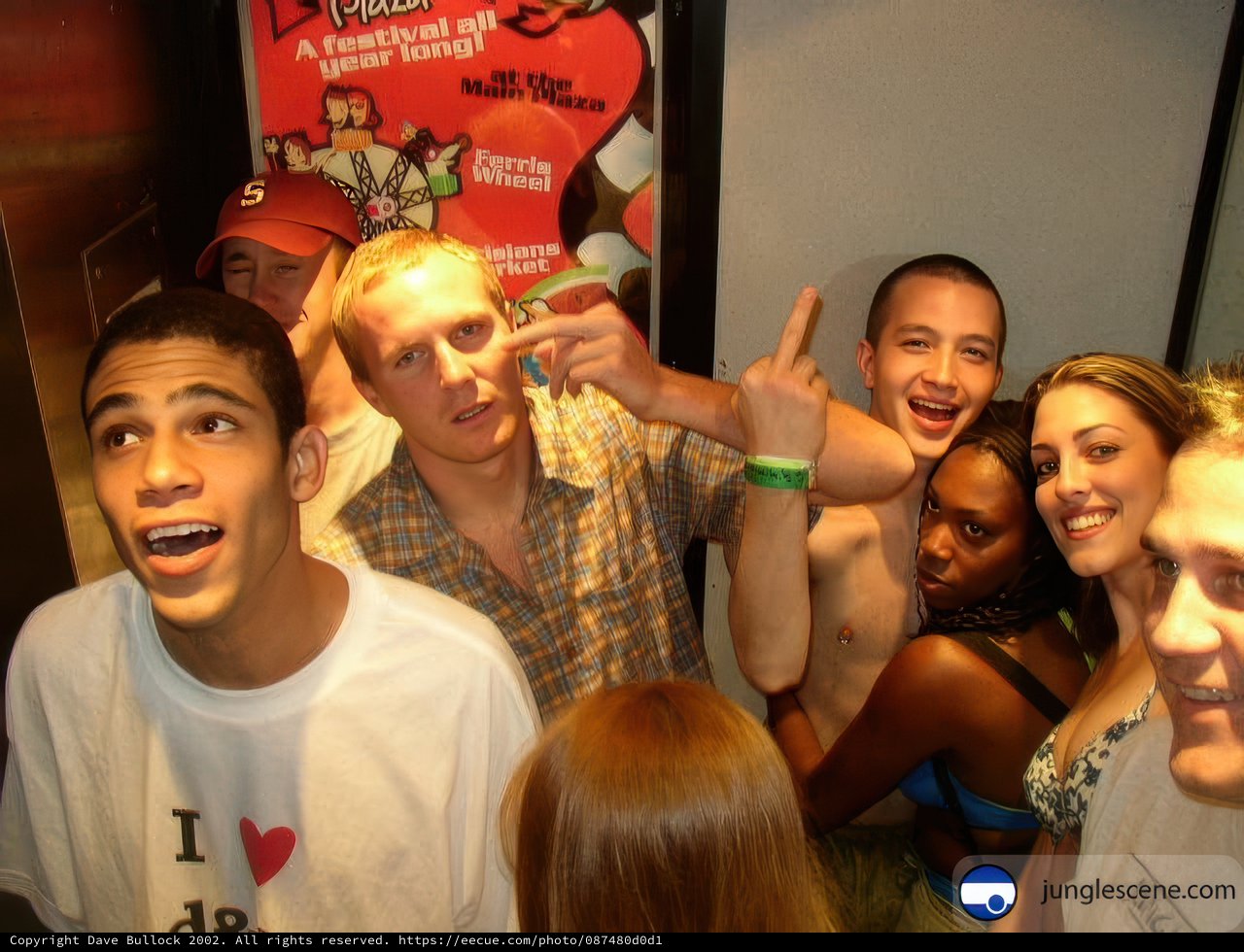 Group Portrait in front of a Poster