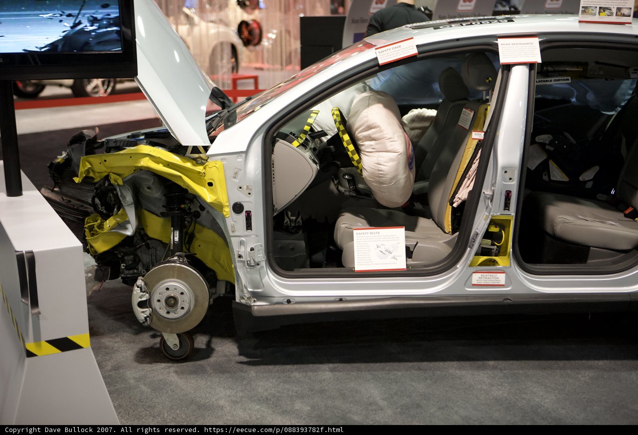 Damaged Yellow and Black Car at LA Auto Show