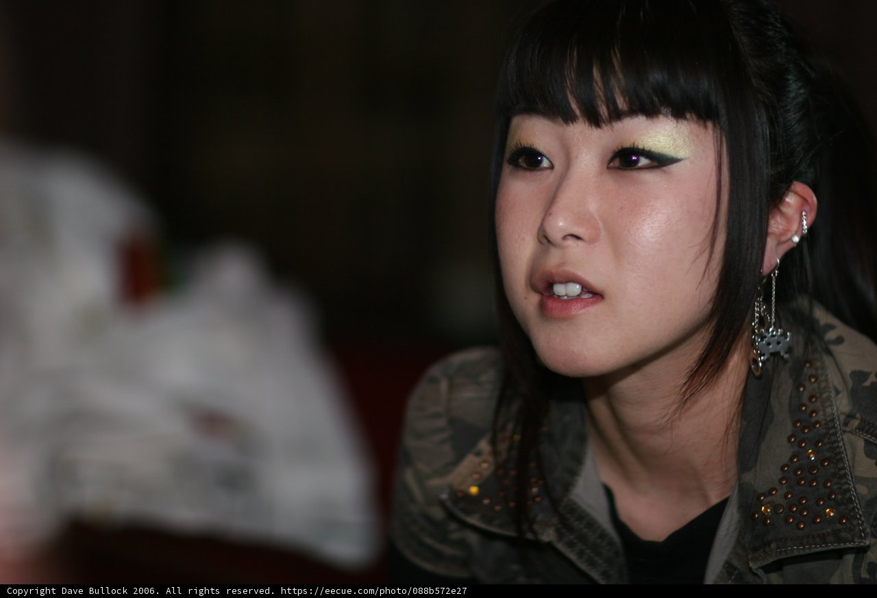 Black-Haired Beauty in a Chic Jacket
