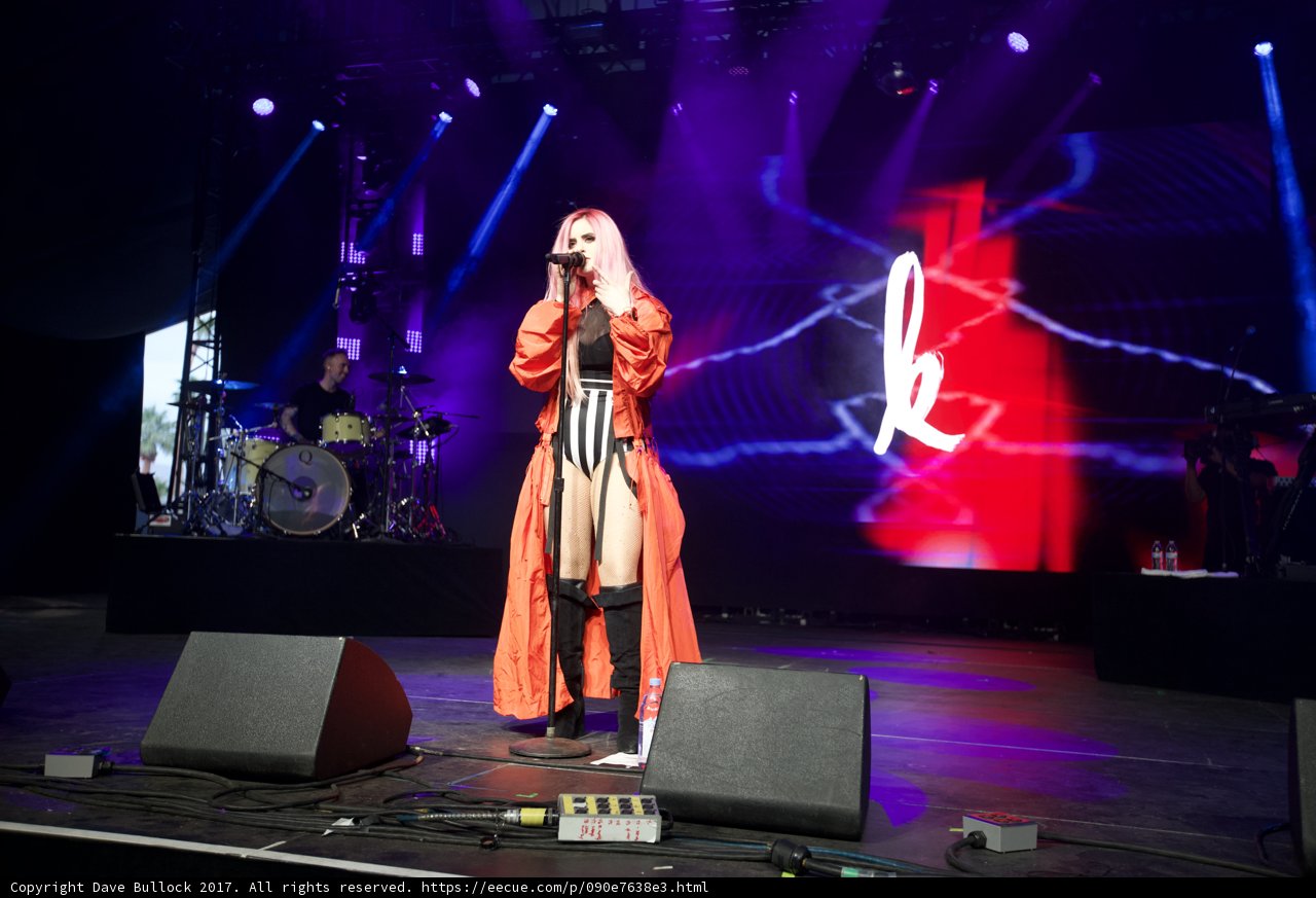 Orange Dress Diva Commands Coachella Stage