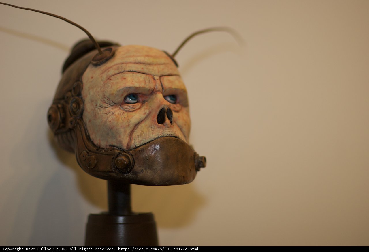 Creepy Bronze Mask Figurine