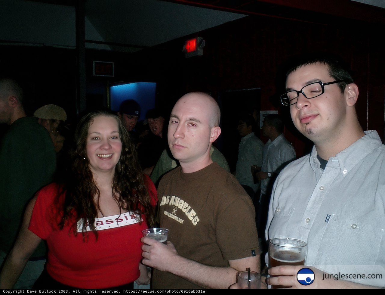 Three Friends Enjoying a Night Out with Beer