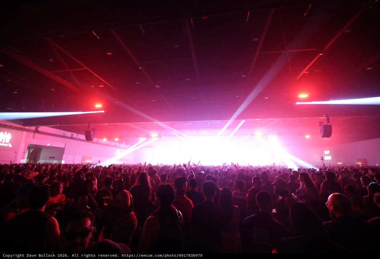 Massive Crowd Surges Toward Blazing Stage Lights