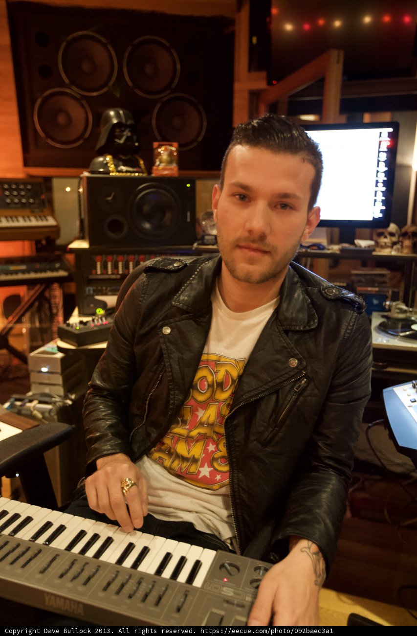 Musician in Leather Jacket Plays Piano