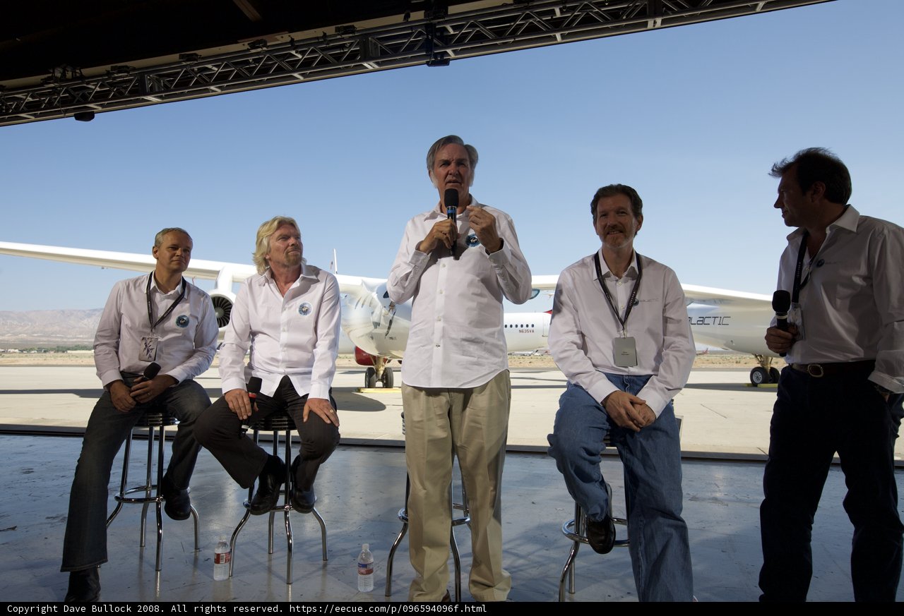 Aviation pioneers Burt Rutan and Richard Branson pose in front of White Knight Two