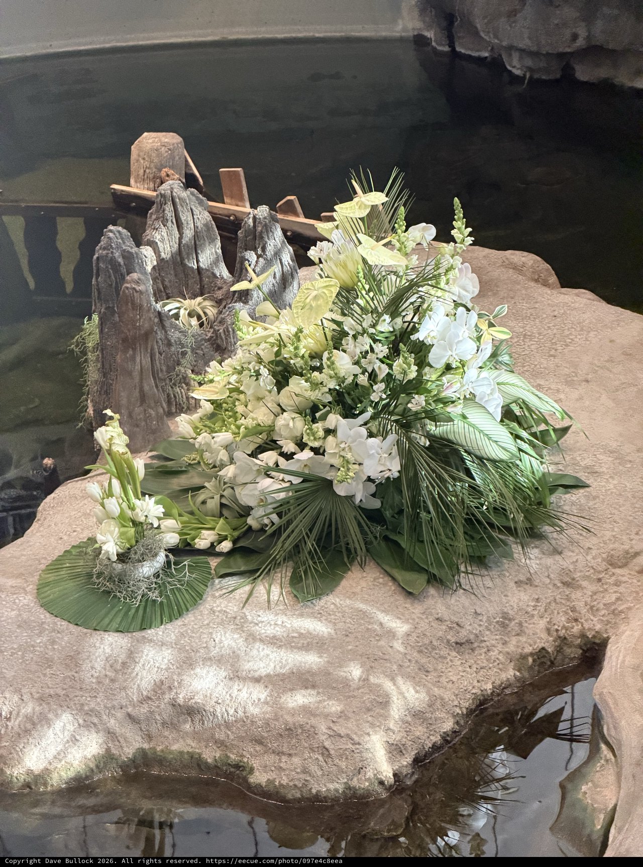 Memorial Floral Arrangement on Rocky Water Feature