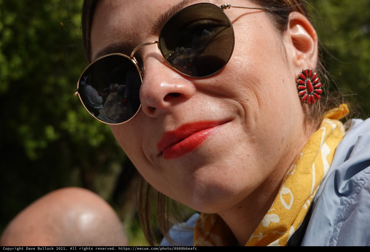 Summer Portrait with Round Sunglasses and Red Lipstick