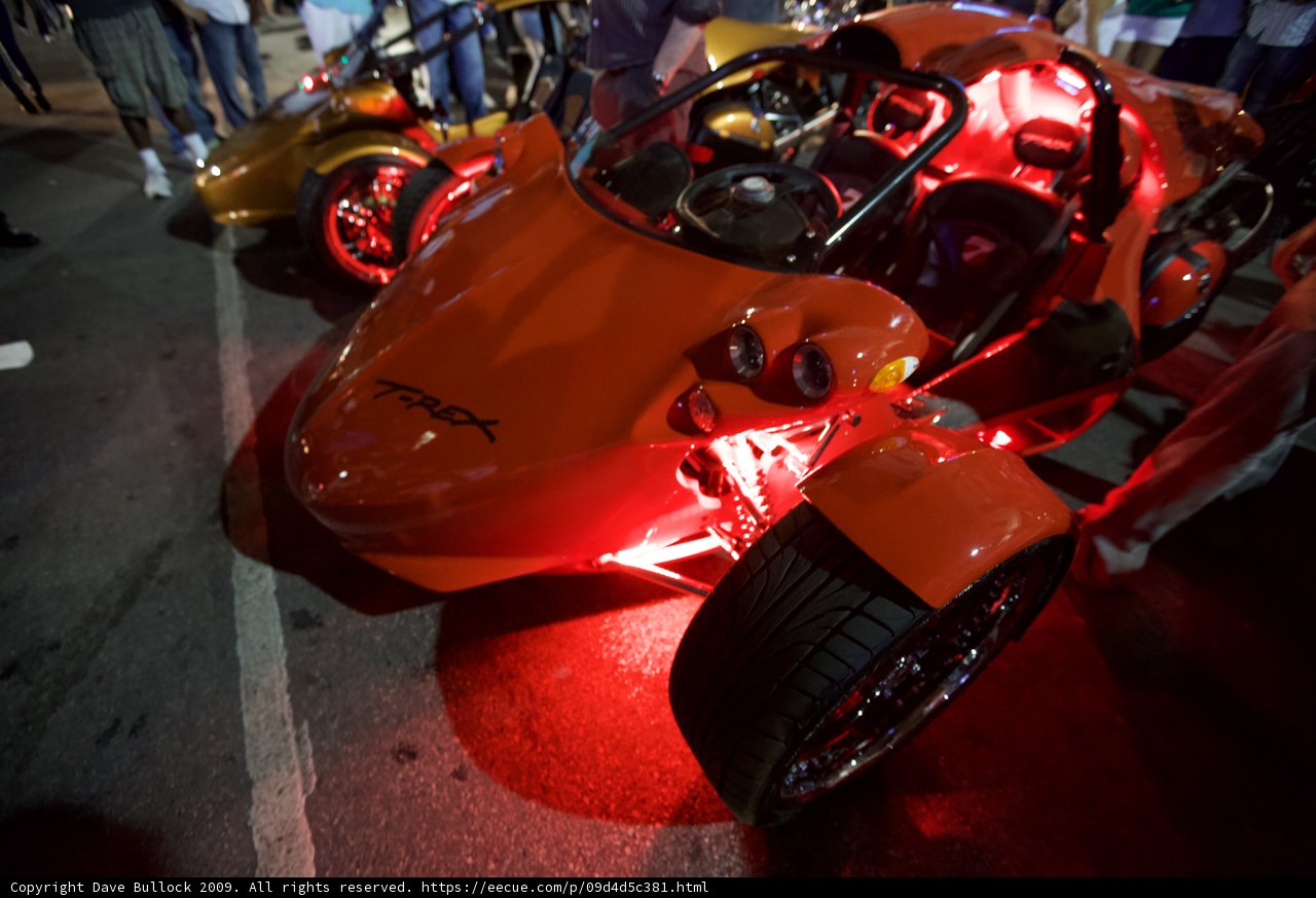 Red-Lit Car Parked in Austin