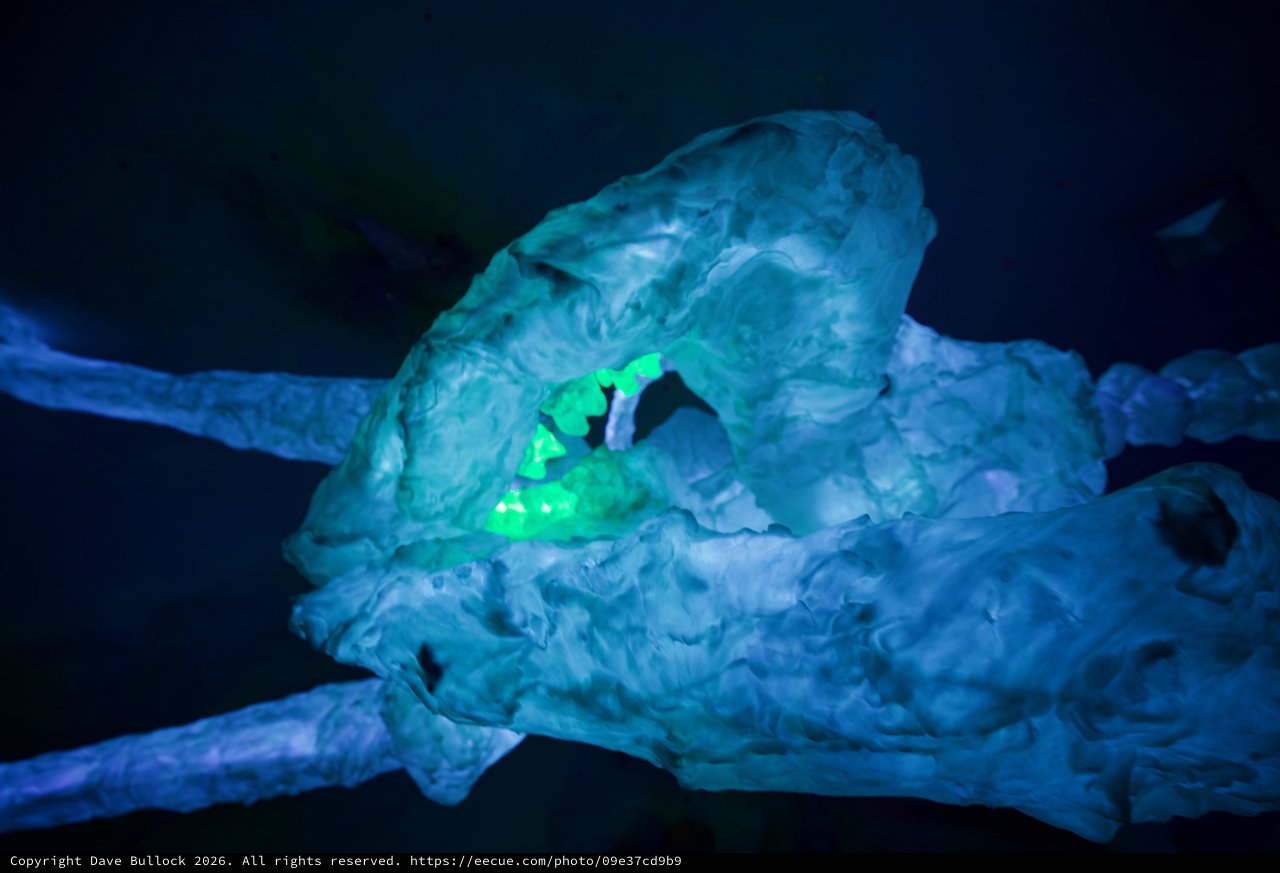 Illuminated Ice Cave Formation in Ethereal Blue Light