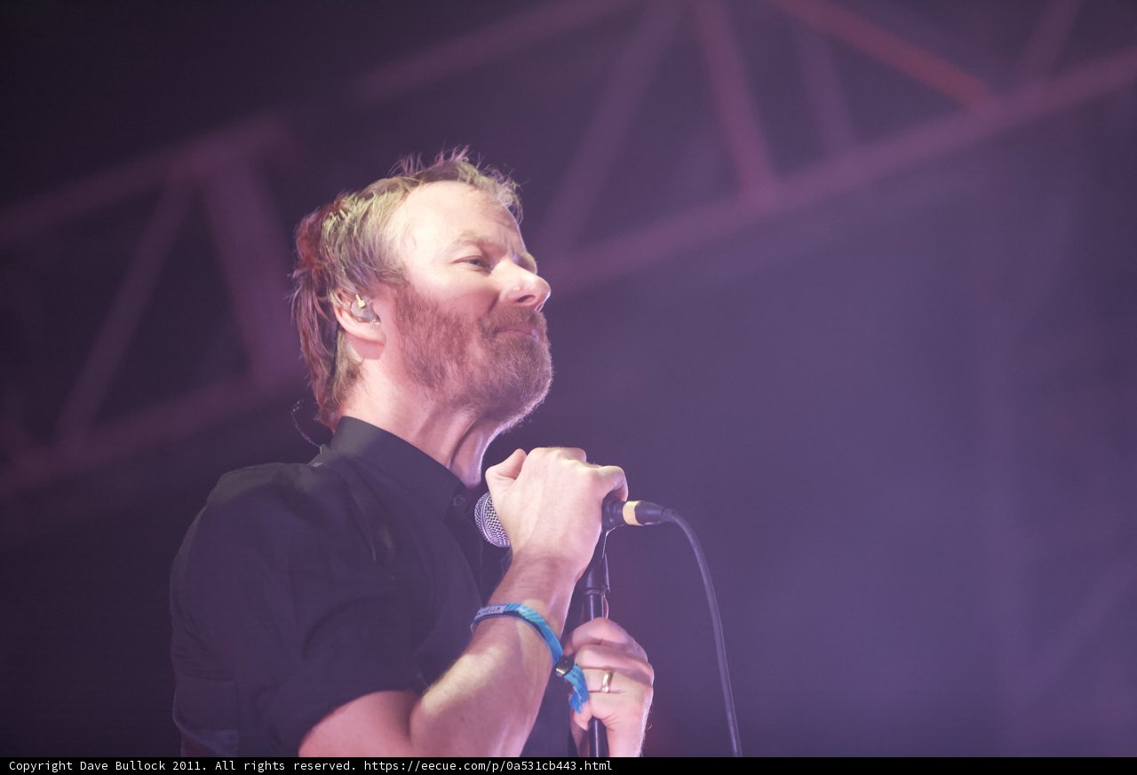 Matt Berninger Shreds it on Stage with Microphone in Hand