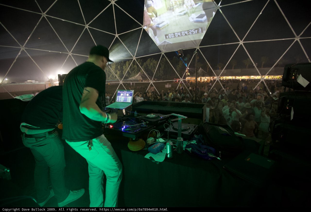 Crowd Captivated by DJ's Performance Under the Dome
