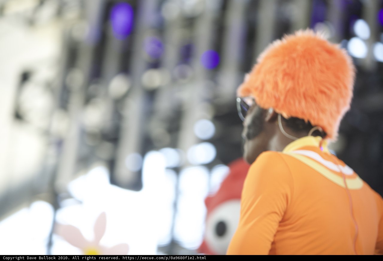 Furry Hat and Orange Shirt