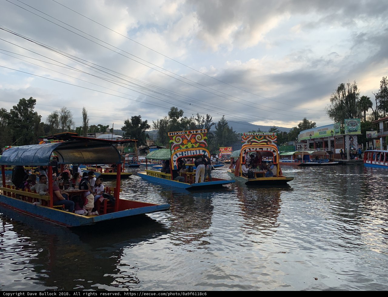 A Fleet of Boats on a Serene River