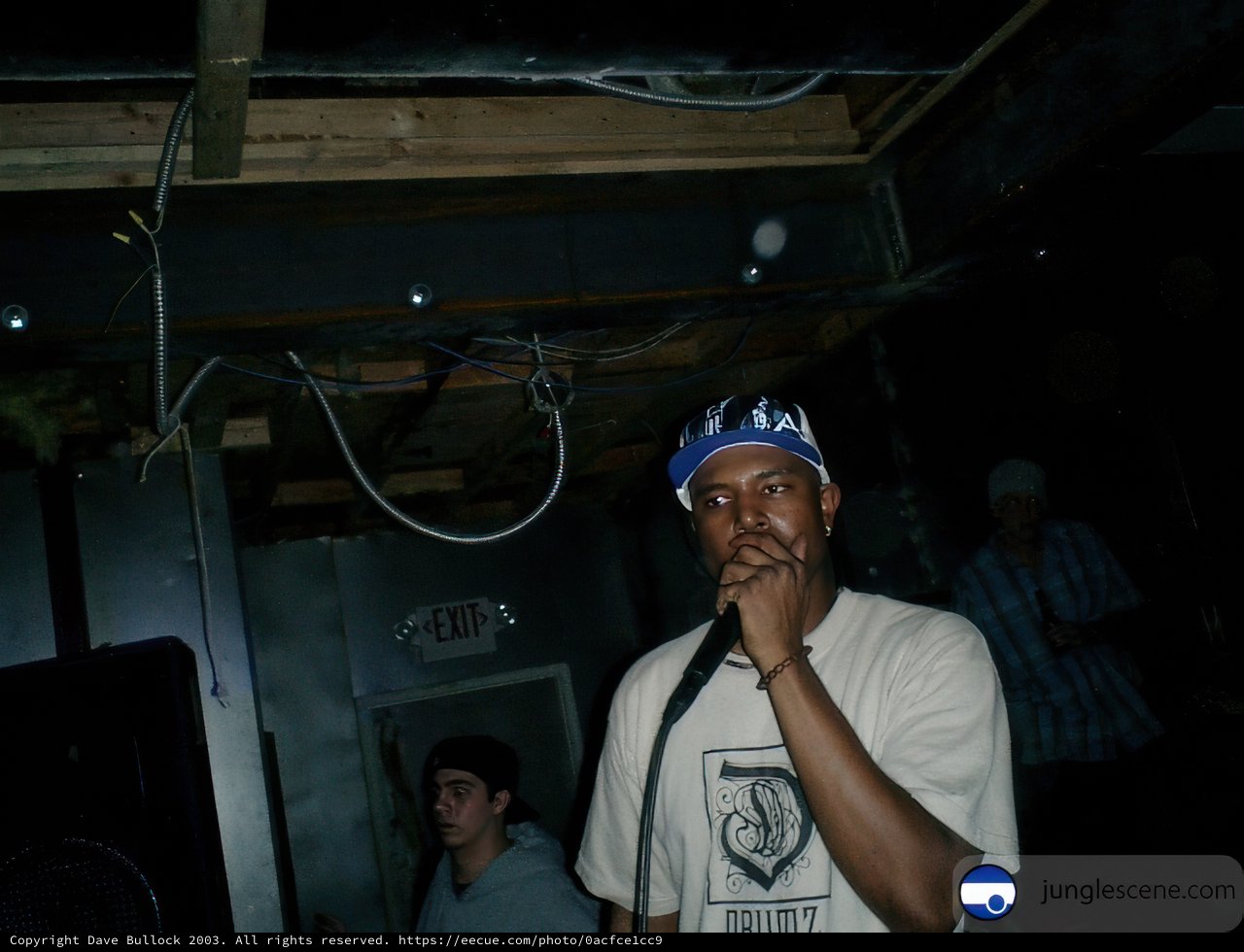 Steve J with Microphone and Blue Hat