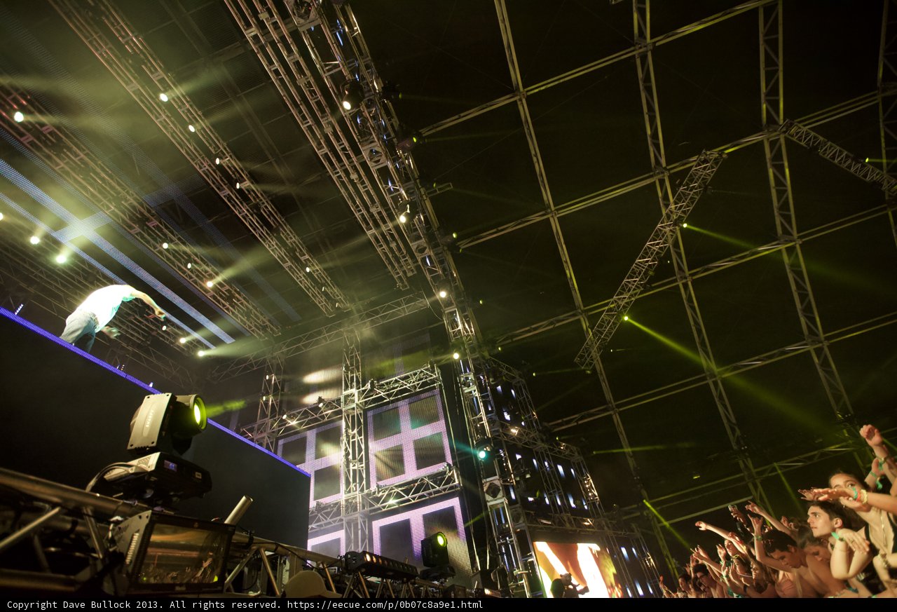 Coachella Rock Concert Illuminated by Lights Caption: Salvatore Cinquegrana and the crowds awash in light at the 2013 Coachella Weekend 1 music festival.