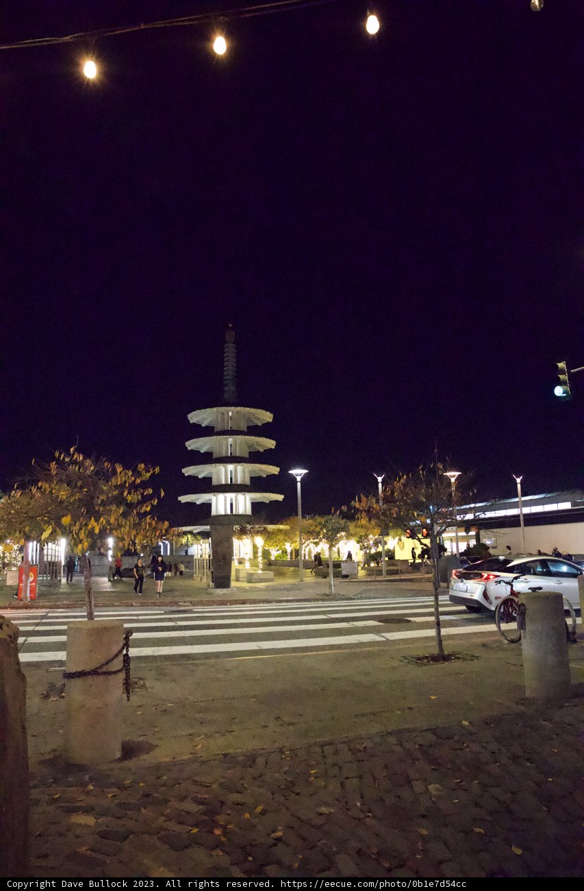 Clock Tower Majesty Amidst City Lights