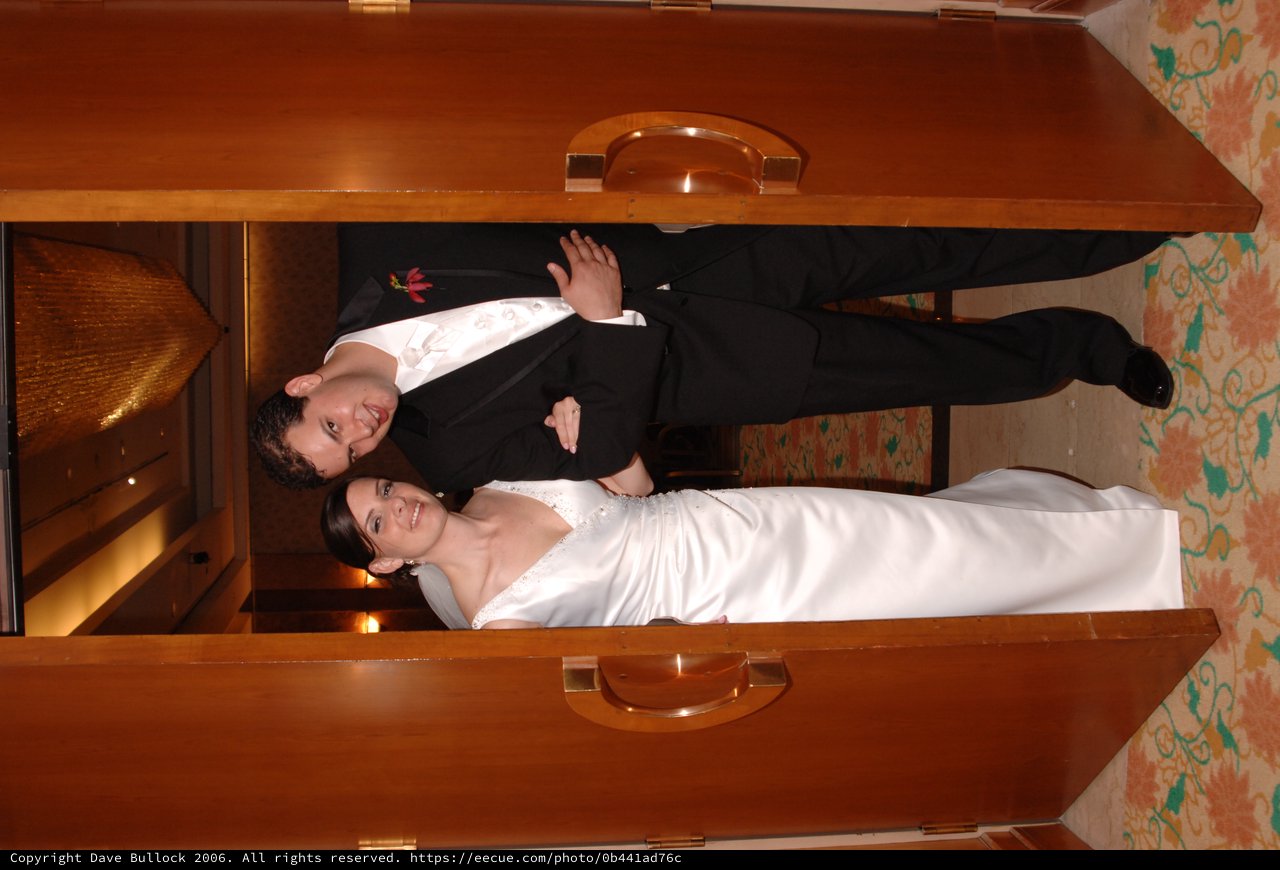 Newlyweds Entering Reception Through Grand Ballroom Doors