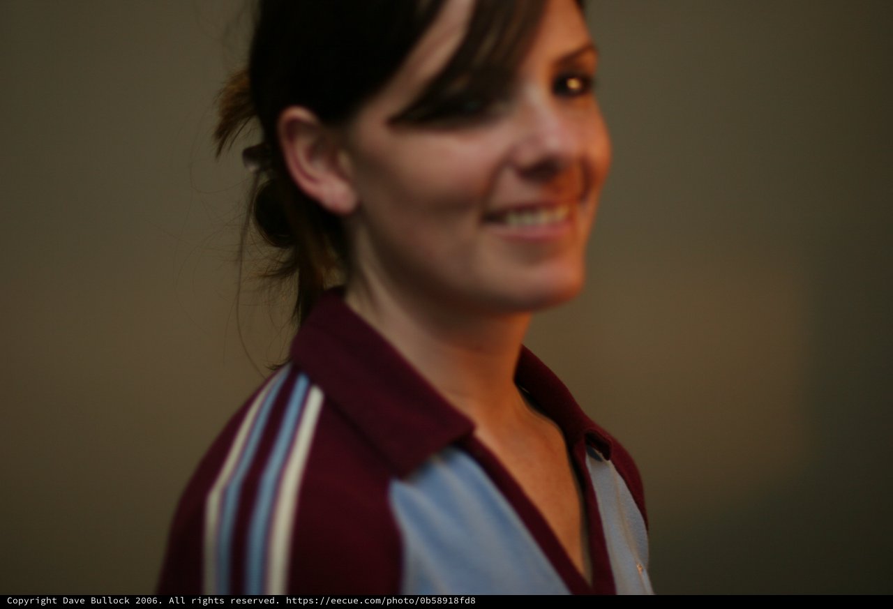 Smiling Woman in Casual Portrait with Bokeh