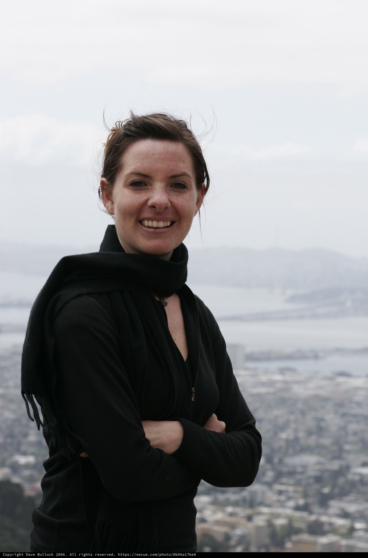 Woman Smiling Atop San Francisco Overlook