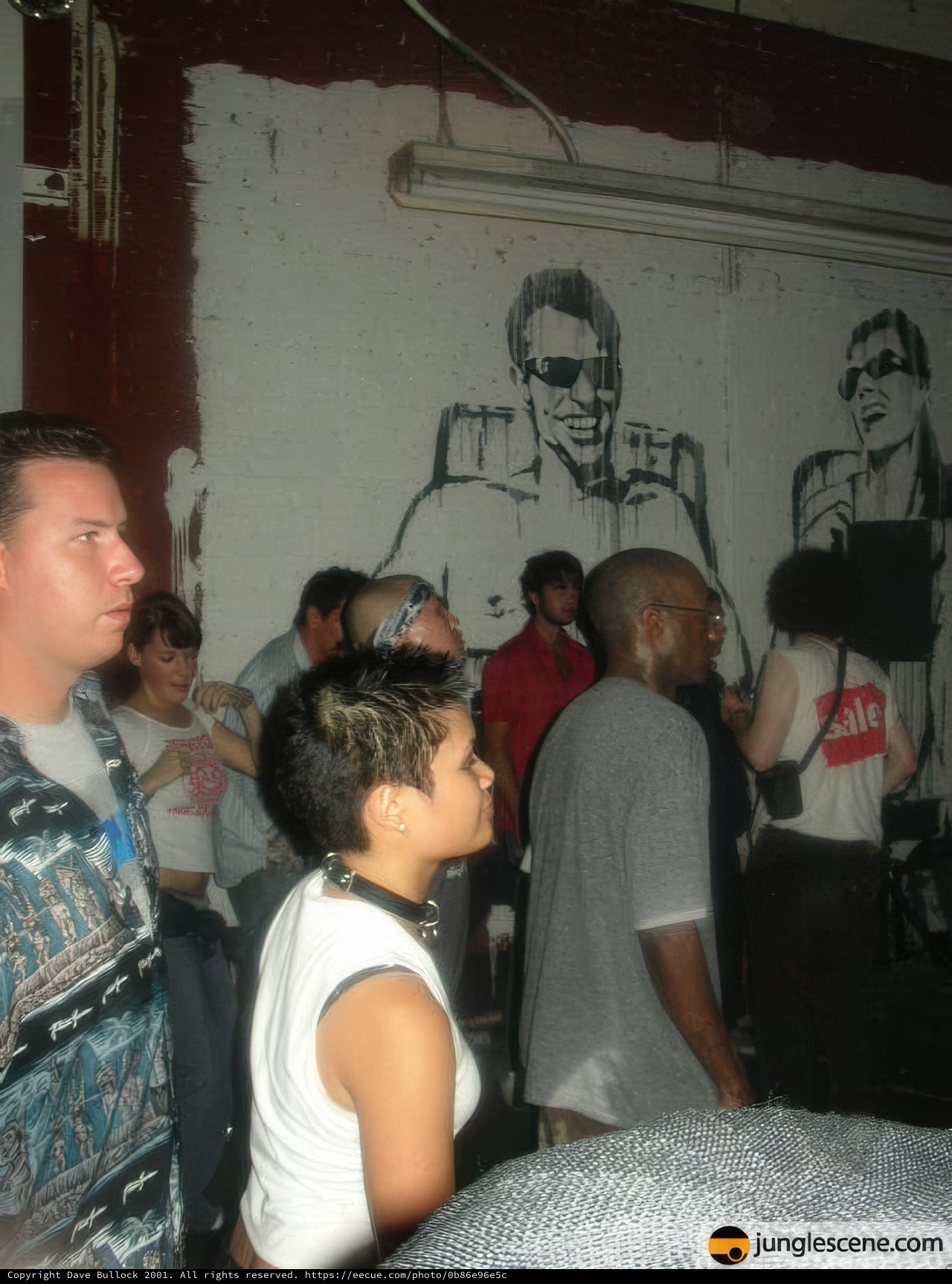 Group Portrait in Front of Colorful Mural