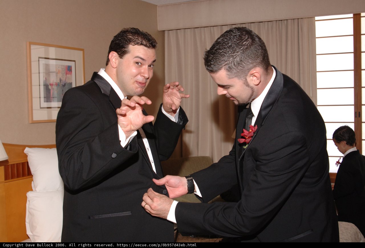 Two Men in Suits Strike a Pose
