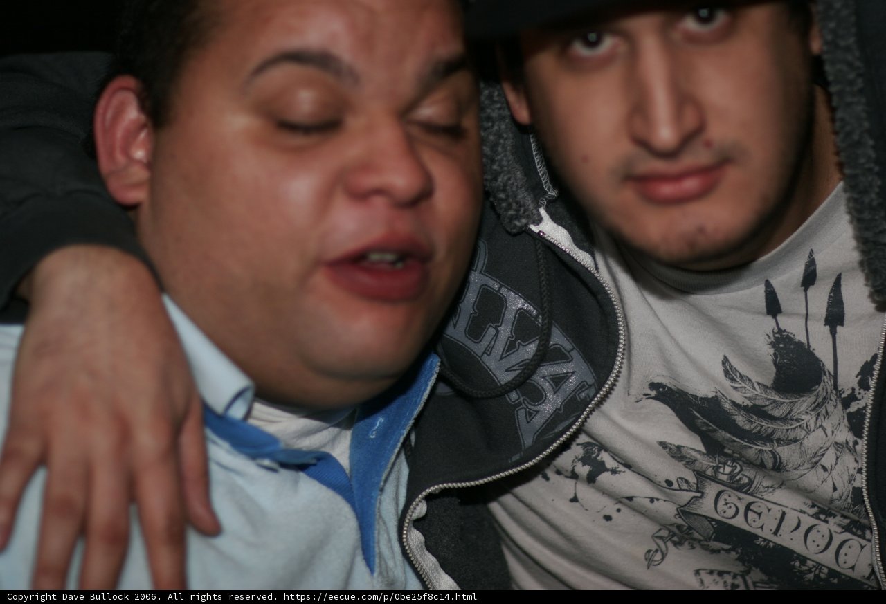 Two Men Strike a Pose