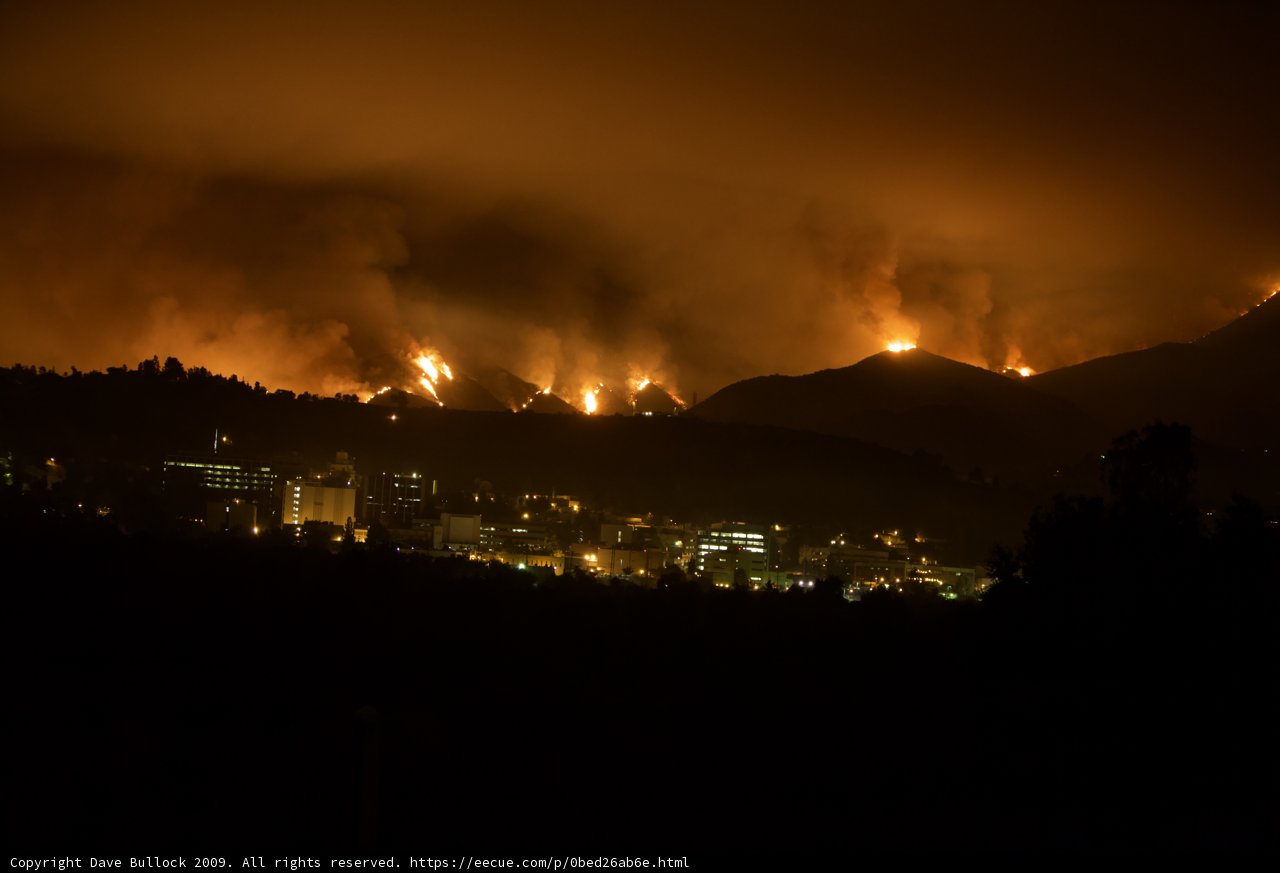 Flames Engulf the Land and Cityscape