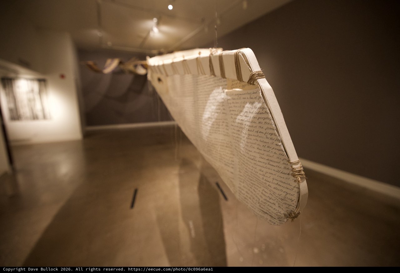 Suspended Text Installation in Museum Gallery Corridor