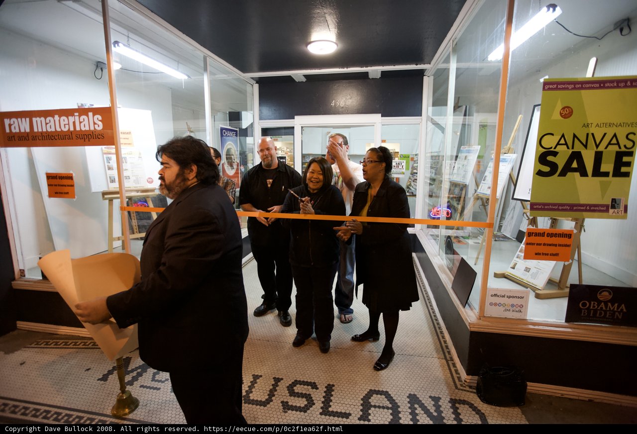 Group of people posing in front of glass door at SRPC show