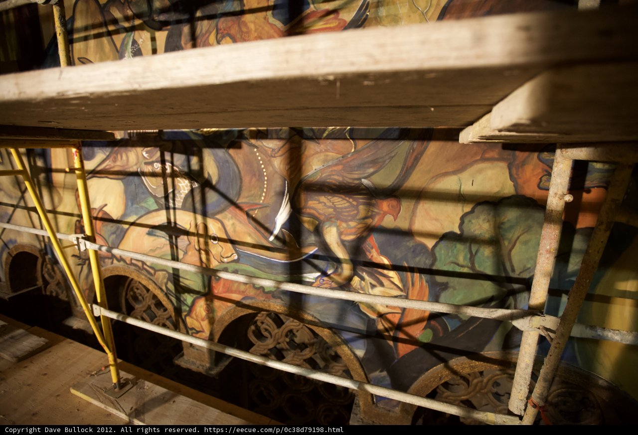 Handrails and Plywood Frame a Stunning Mural