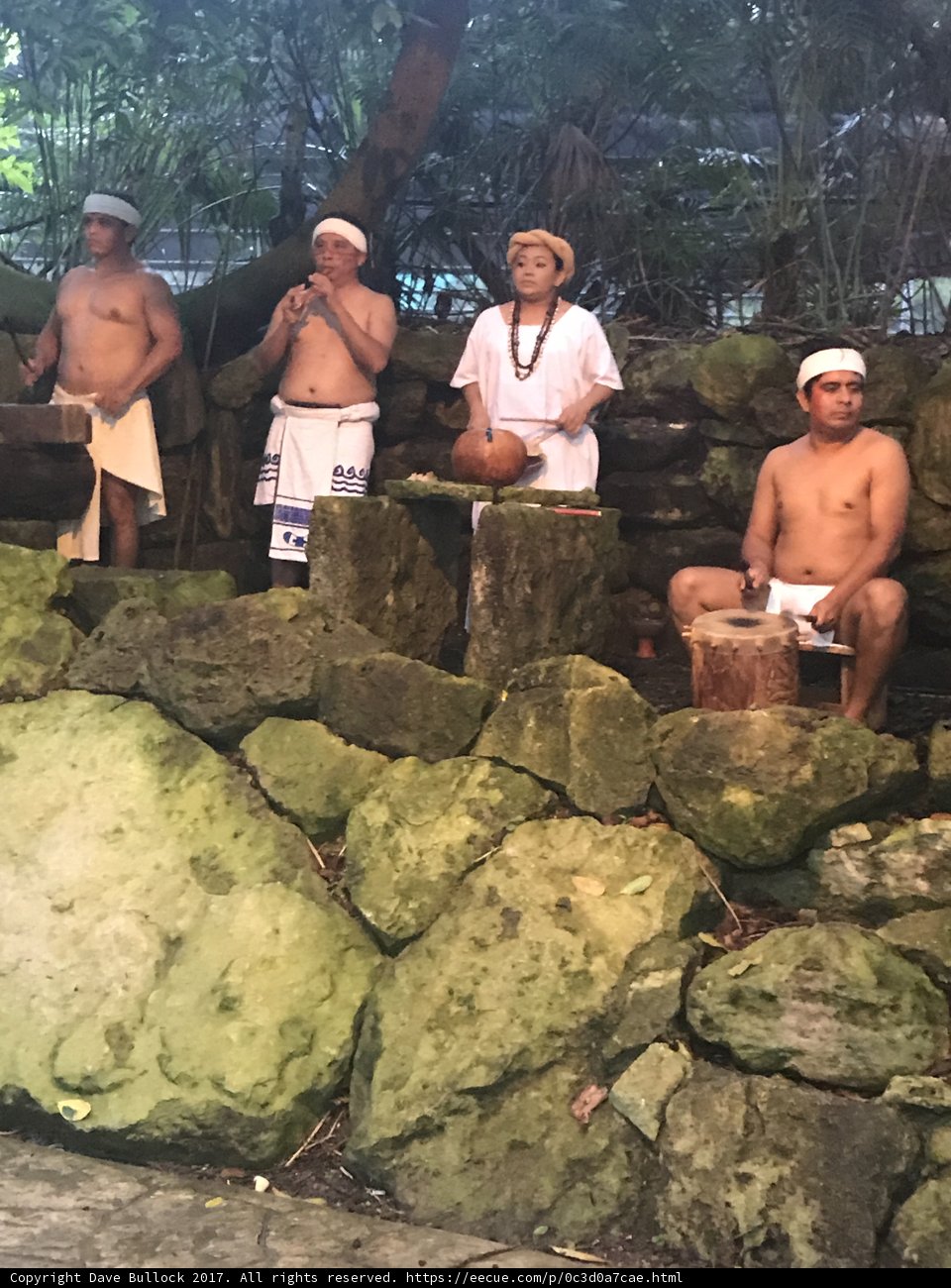 Traditional Dressed Men Gathering on Slate Rocks