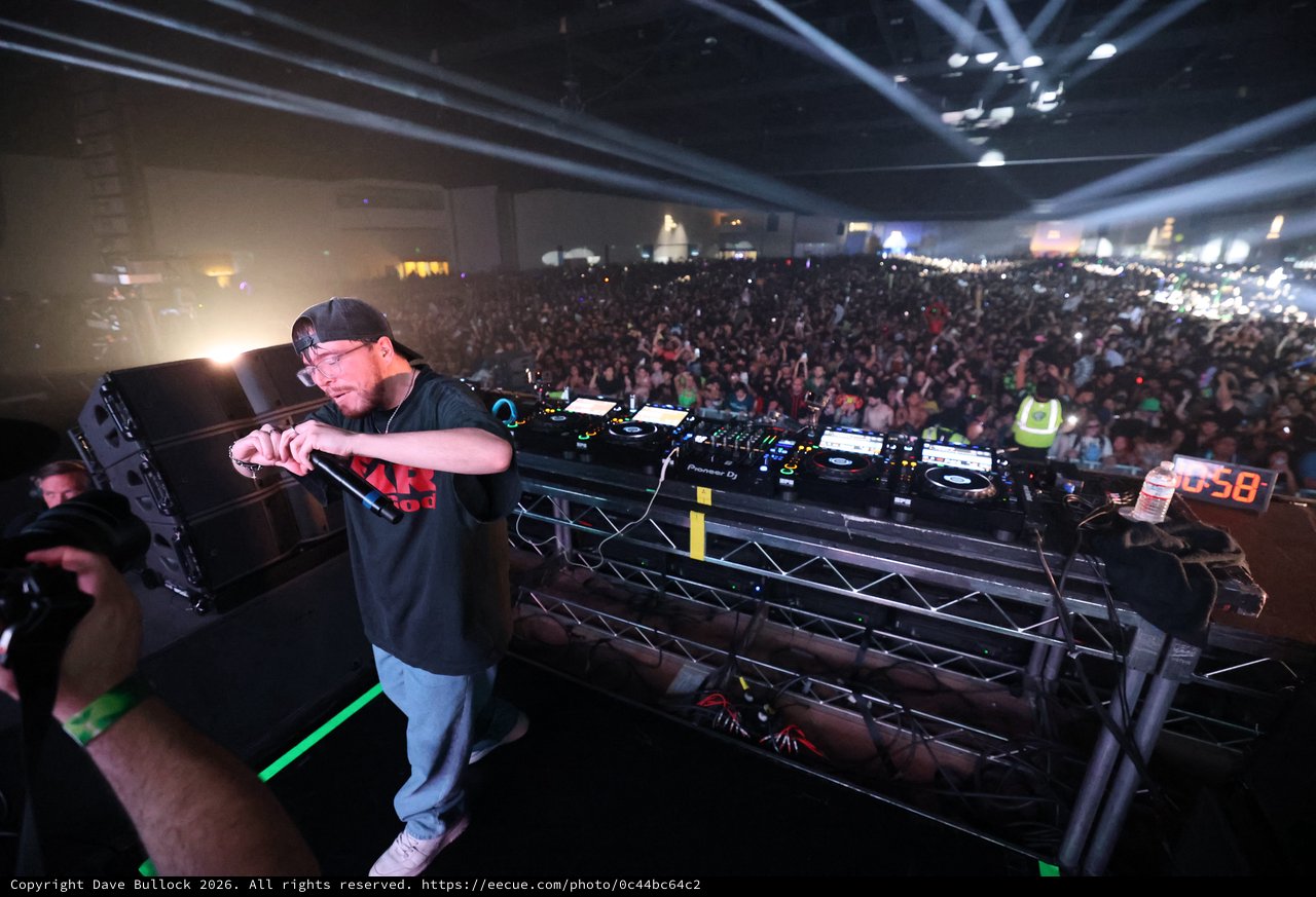 DJ Commands Massive Indoor Festival Crowd from Stage