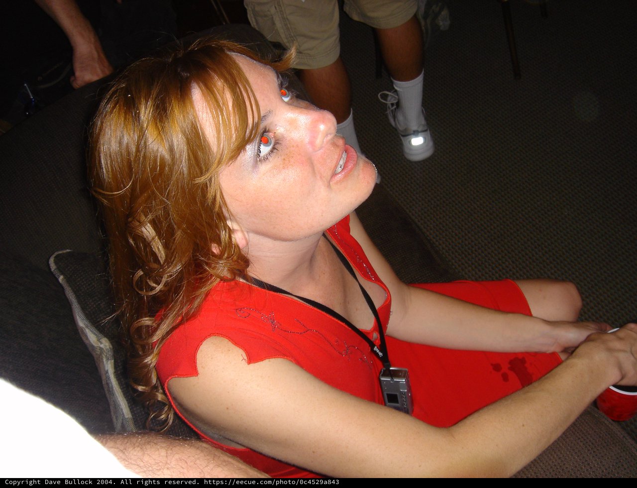 Young Woman in Red at Indoor Gathering 2004
