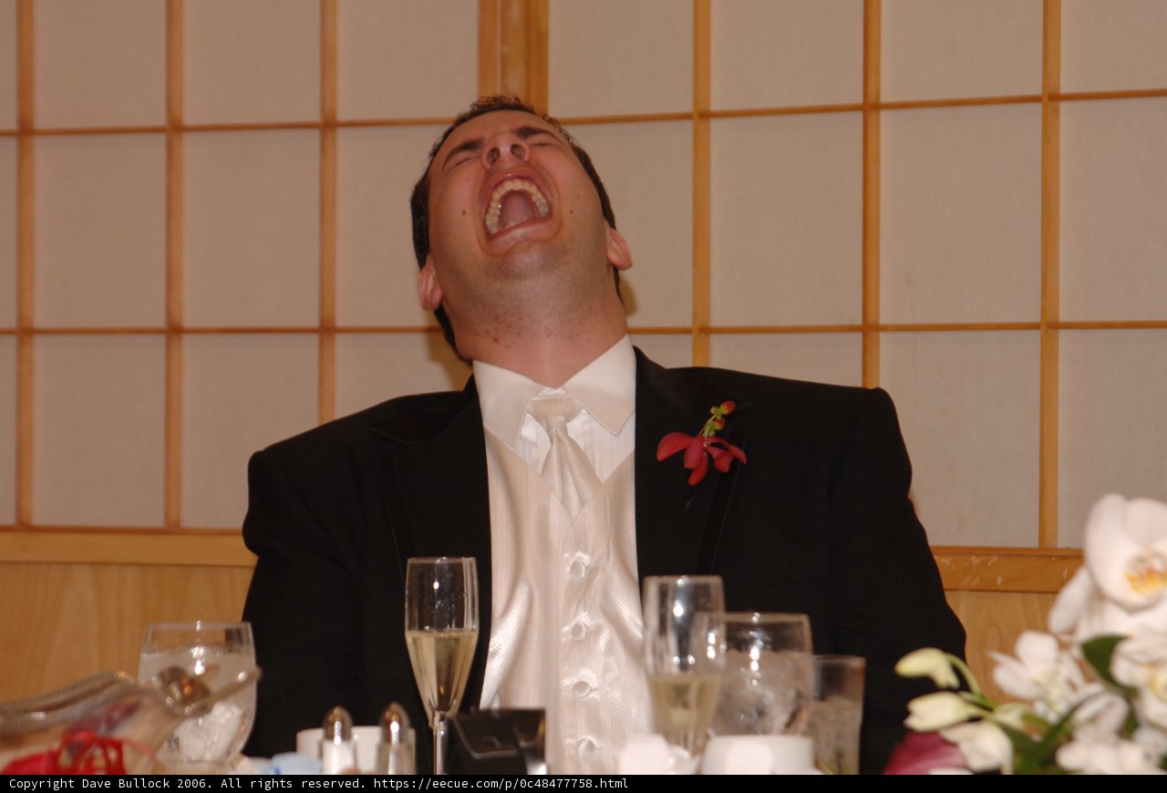 The Groom in His Classic Black Suit
