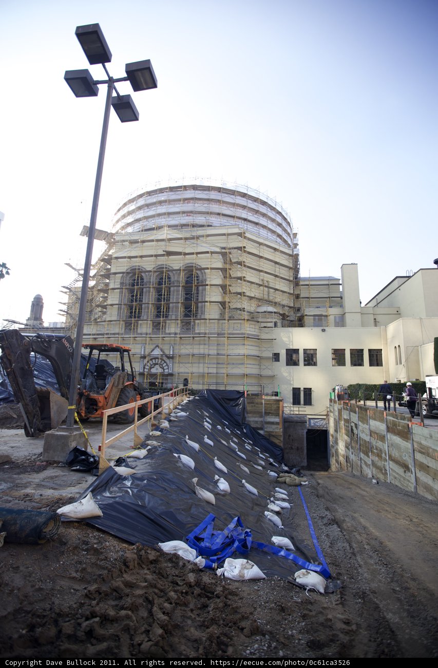 Building Under Construction with Blue Tarp
