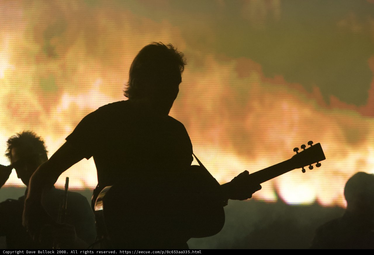 Fire & Strings: A Man's Musical Performance at Coachella