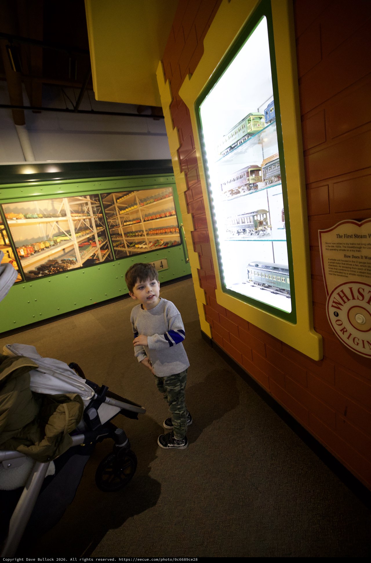 Young Boy Exploring Train Museum Display