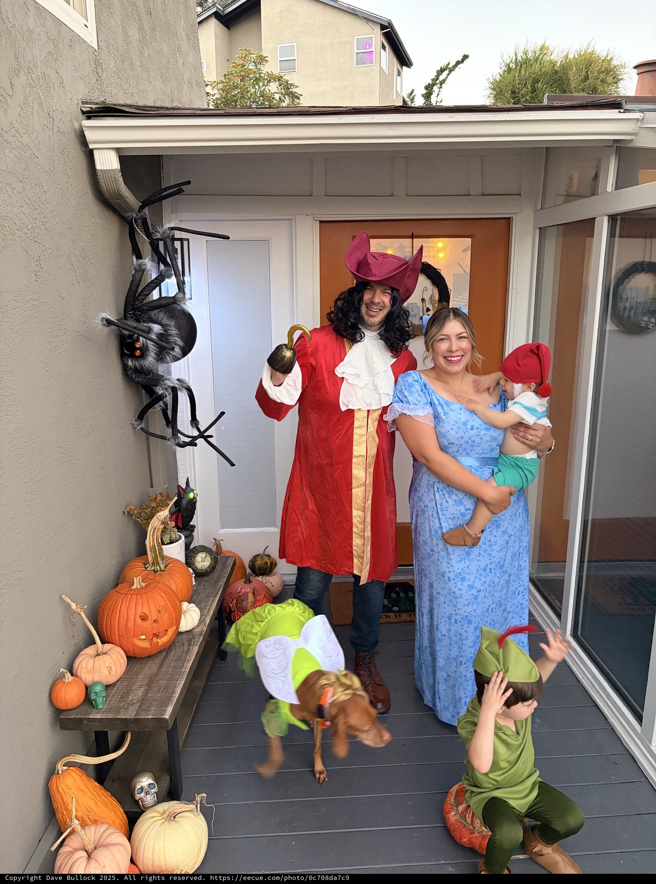 Family Peter Pan Halloween Costume at Decorated Porch