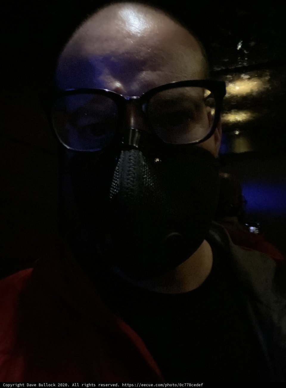 Masked man in the dark