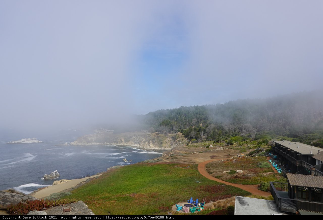 Spectacular Scenery of the Foggy Ocean from a Promontory