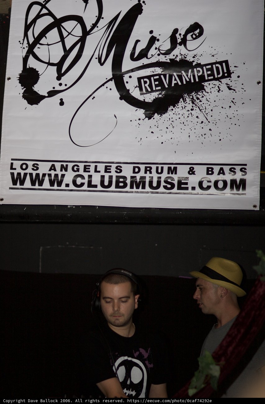 Hat-wearing Men at Club