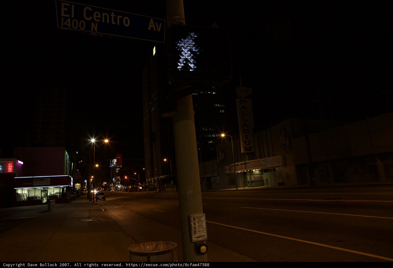 Illuminated Street Sign at Night
