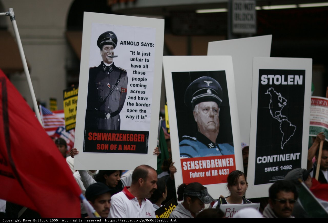 Student Protesters Hold Up Nazi Leaders' Posters
