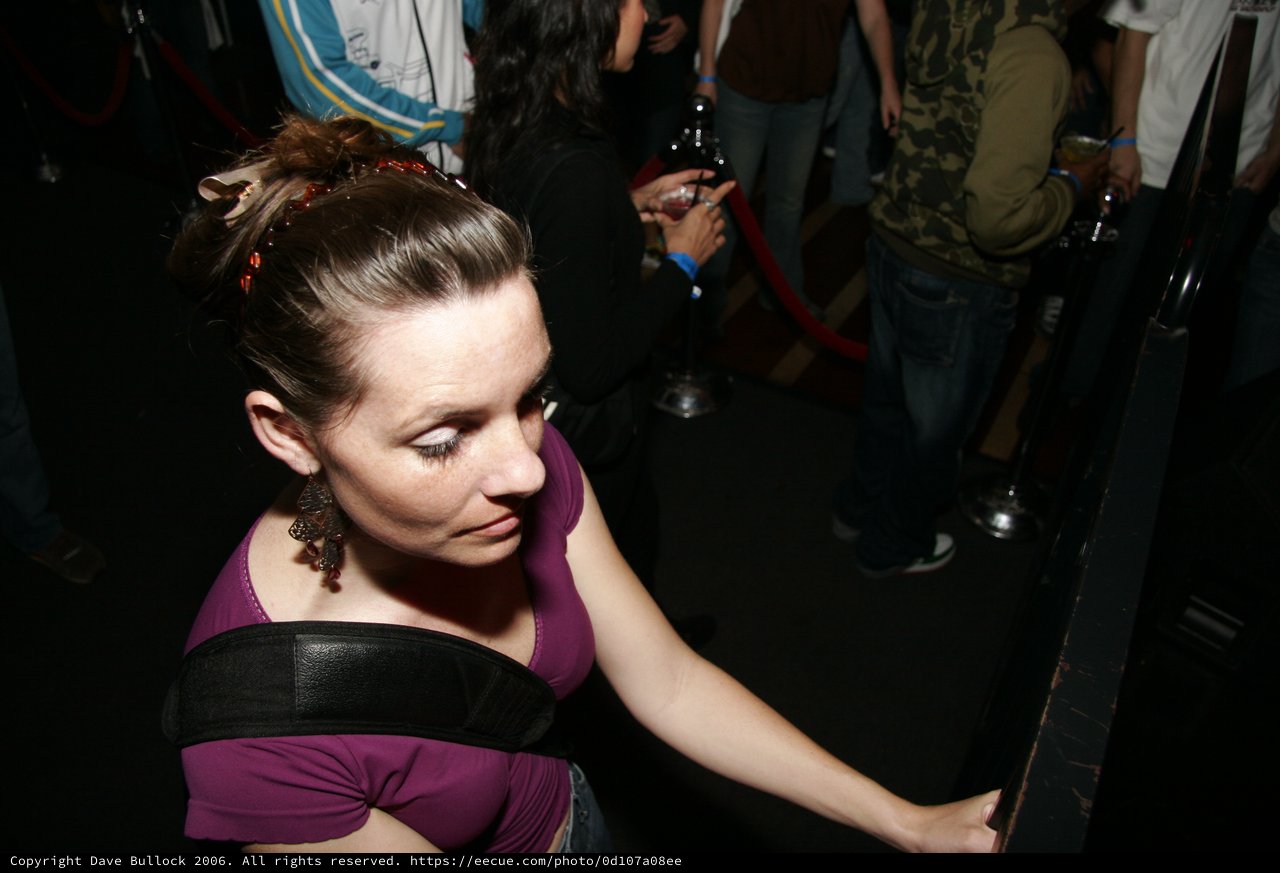 Woman at Nightclub Party Looking Downward 2006